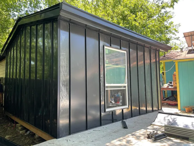 Black standing seam metal wall panels for Roof Inspection in Richmond